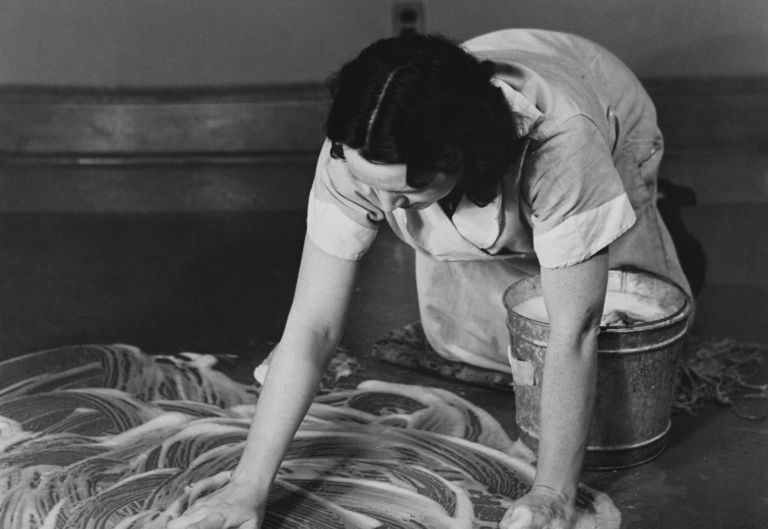 https://www.gettyimages.com/detail/news-photo/woman-on-her-knees-scrubbing-a-floor-circa-1930-news-photo/93448497?adppopup=true