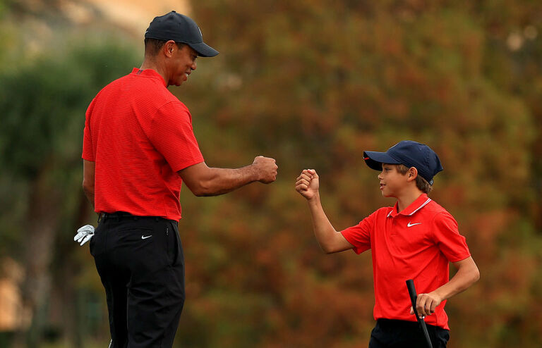 https://www.gettyimages.com/detail/news-photo/tiger-woods-of-the-united-states-and-son-charlie-woods-fist-news-photo/1292296441
