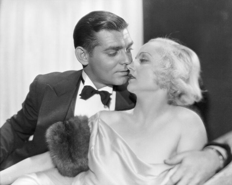 https://www.gettyimages.co.uk/detail/news-photo/studio-portrait-of-clark-gable-and-carole-lombard-kissing-news-photo/515451814