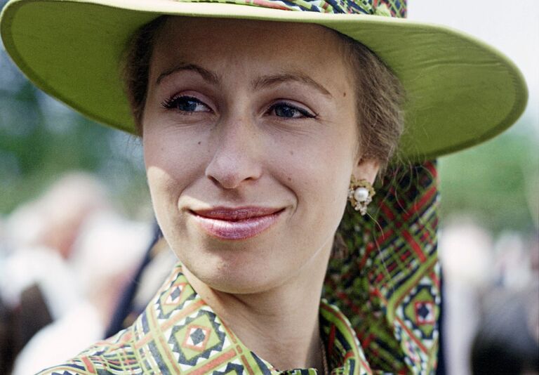 Princess Anne in green at a fete