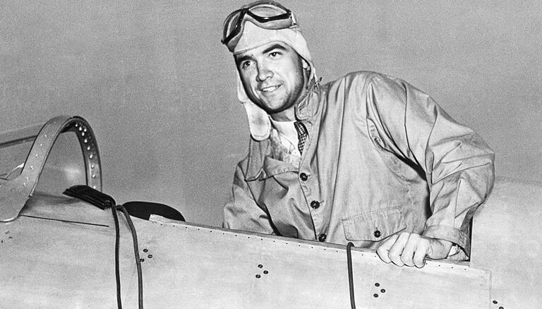 Howard Hughes in Cockpit of Airplane