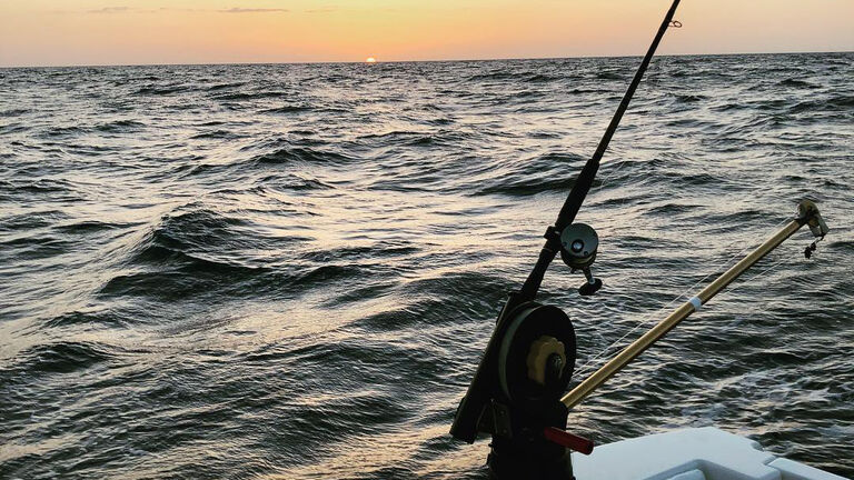 fishing horizon sunset