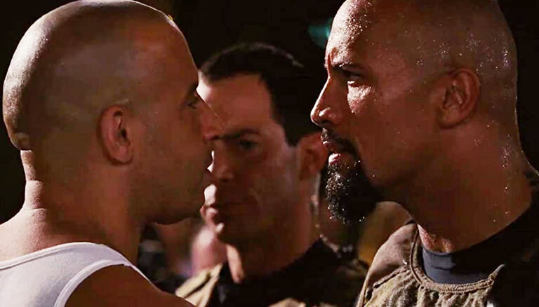 Vin Diesel, Yorgo Constantine, and Dwayne Johnson in Fast Five (2011)
