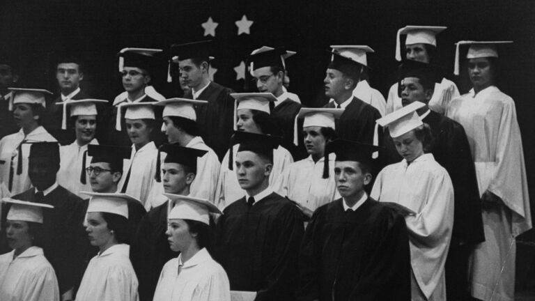 High school graduates in cap