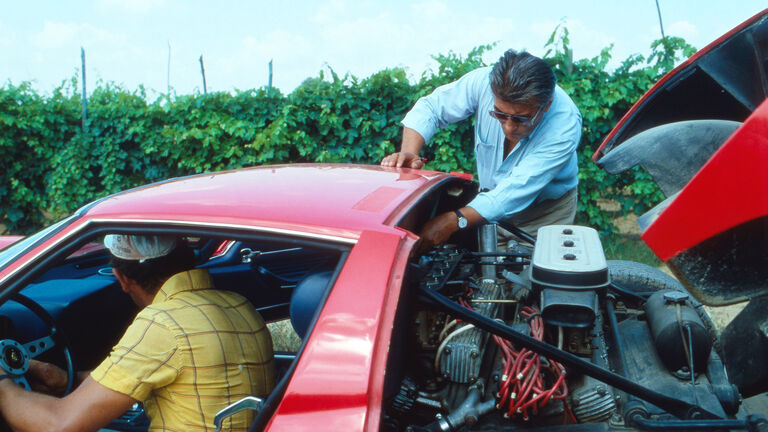 Ferruccio Lamborghini with his car
