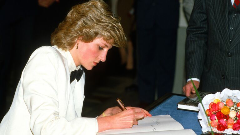 Princess Diana signing