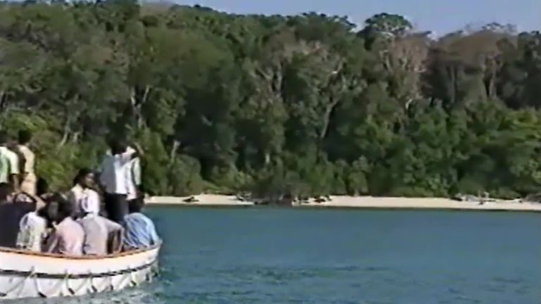 men riding boat