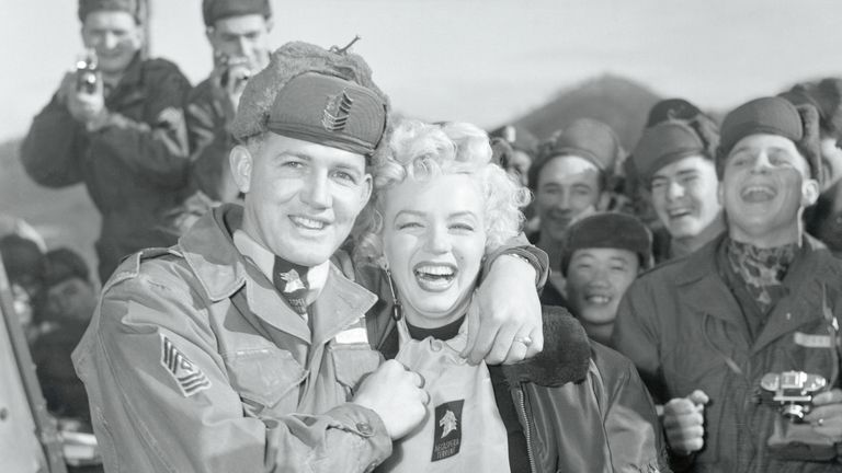 Marilyn Monroe with Master Sergeant Guy Morgan