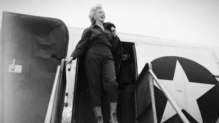 Monroe stepping off plane at Seoul City Airport