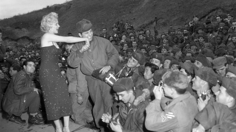 Marilyn Monroe on Stage in Front of Crowd of Troops