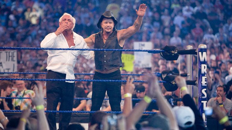 Mickey Rourke celebrates with Ric Flair