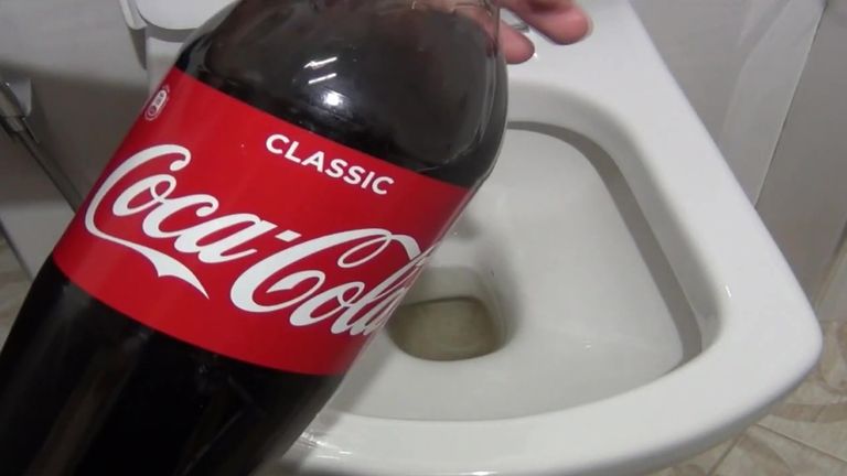 cleaning toilet with coke