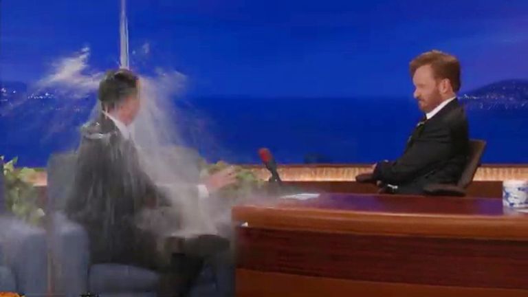 Tom Hanks gets wet on Conan