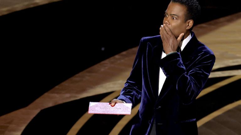 https://www.gettyimages.co.uk/detail/news-photo/chris-rock-speaks-onstage-during-the-94th-annual-academy-news-photo/1388085251