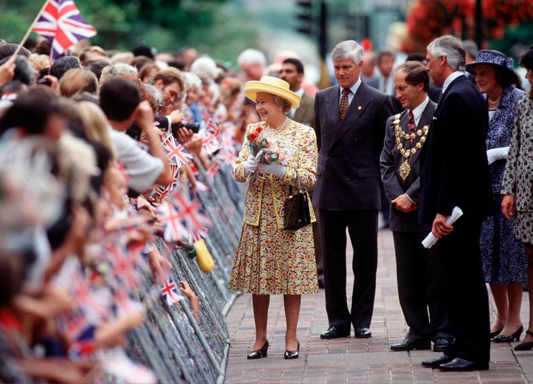Queen Elizabeth with her bodyguard