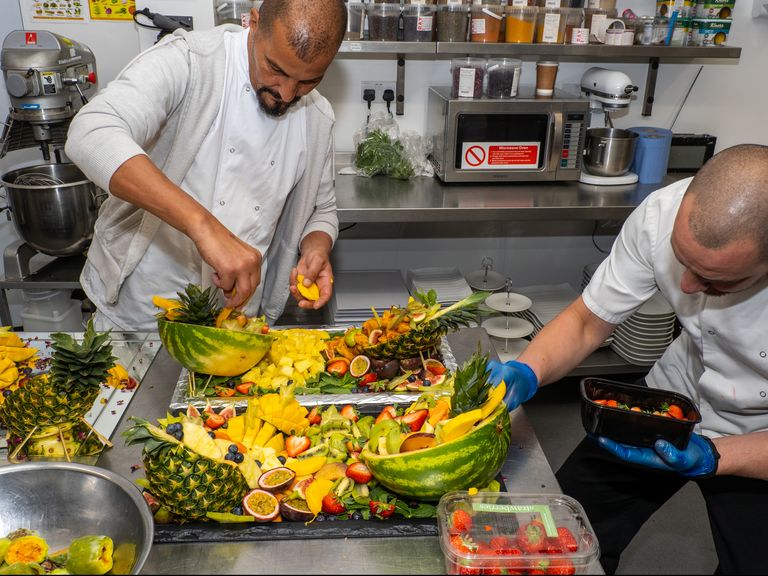 Chefs prepare fruit for the Platinum Jubilee
