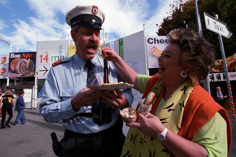 feeding policeman with sauerkraut