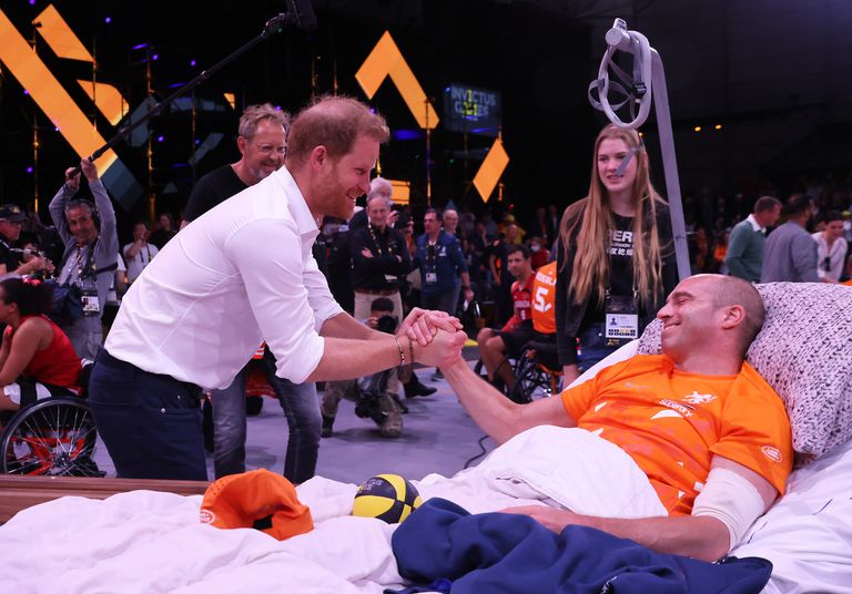 https://www.gettyimages.co.uk/detail/news-photo/prince-harry-duke-of-sussex-talks-to-injured-member-of-team-news-photo/1392762369?phrase=Prince%20Harry%202022&adppopup=true