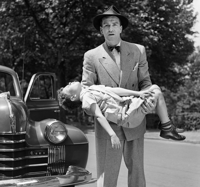 https://www.gettyimages.co.uk/detail/news-photo/1950s-distraught-man-looking-at-camera-carrying-unconscious-news-photo/604434935 carrying unconscious kid