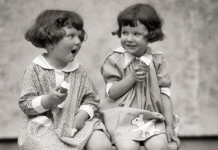 https://www.gettyimages.co.uk/detail/news-photo/1920s-two-little-girls-sitting-on-bench-eating-ice-cream-news-photo/1062085098 little girls eating ice cream