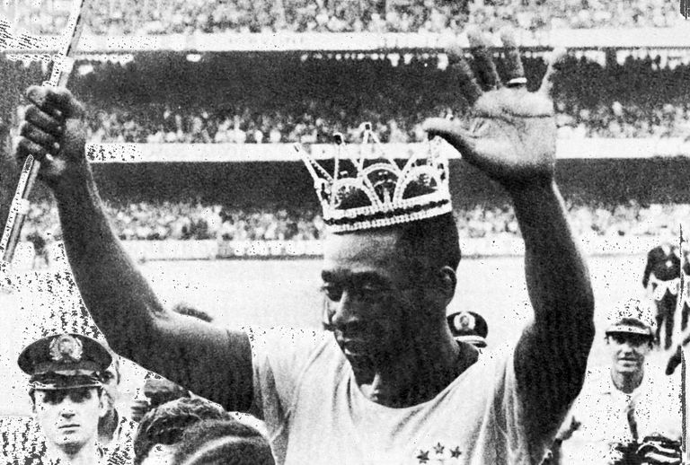 https://www.gettyimages.co.uk/detail/news-photo/pel%C3%A9-wears-a-crown-and-holds-a-scepter-as-brazil-are-news-photo/1450708840 Pele