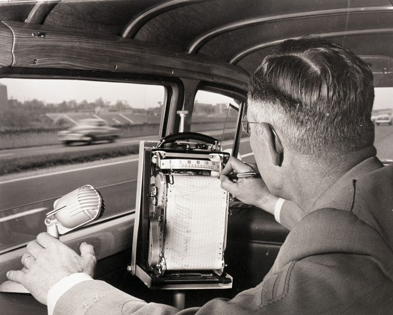 https://www.gettyimages.co.uk/detail/news-photo/photo-shows-a-policeman-checking-automobile-speed-on-the-news-photo/515988282 policeman checking automobile speed