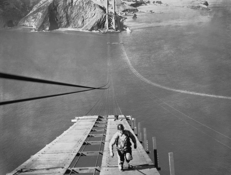 https://www.gettyimages.com/detail/news-photo/worker-running-up-one-of-the-catwalks-being-built-for-the-news-photo/495296915?phrase=golden%20gate%20bridge&adppopup=true