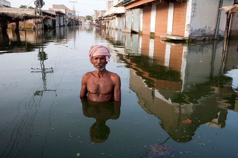 https://www.gettyimages.co.uk/detail/news-photo/ahmed-stands-in-the-centre-of-the-town-of-khairpur-nathan-news-photo/593276608?phrase=climate%20change&adppopup=true