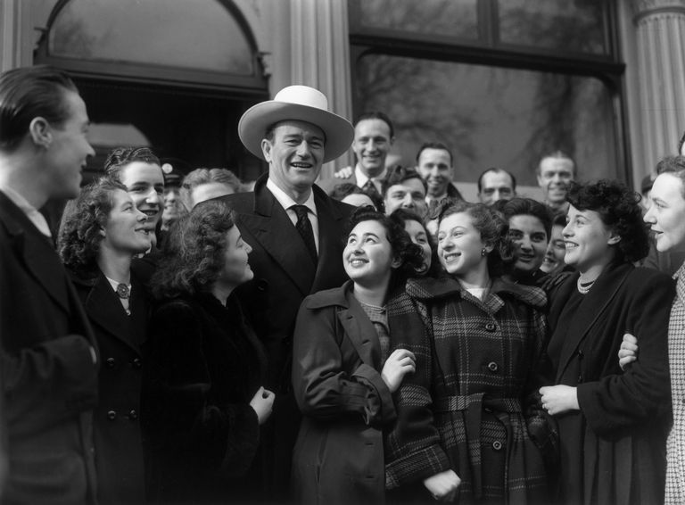 https://www.gettyimages.com/detail/news-photo/american-actor-john-wayne-surrounded-by-fans-at-the-opening-news-photo/3228622?phrase=john%20wayne%20house&adppopup=true