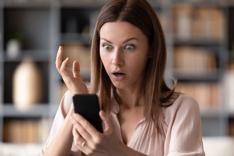 https://www.gettyimages.co.uk/detail/photo/close-up-young-shocked-woman-looking-at-mobile-royalty-free-image/1217463785 shocked woman