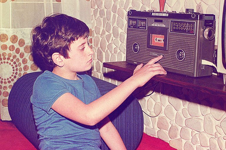 https://www.gettyimages.co.uk/detail/photo/vintage-teenage-boy-playing-music-on-a-radio-royalty-free-image/1401273929?phrase=cassette%20tape%2080s&adppopup=true