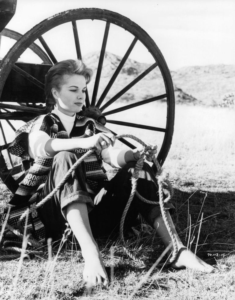 https://www.gettyimages.com/detail/news-photo/martha-hyer-sitting-next-to-stagecoach-wheel-in-a-scene-news-photo/138695047?phrase=woman%20stagecoach&adppopup=true