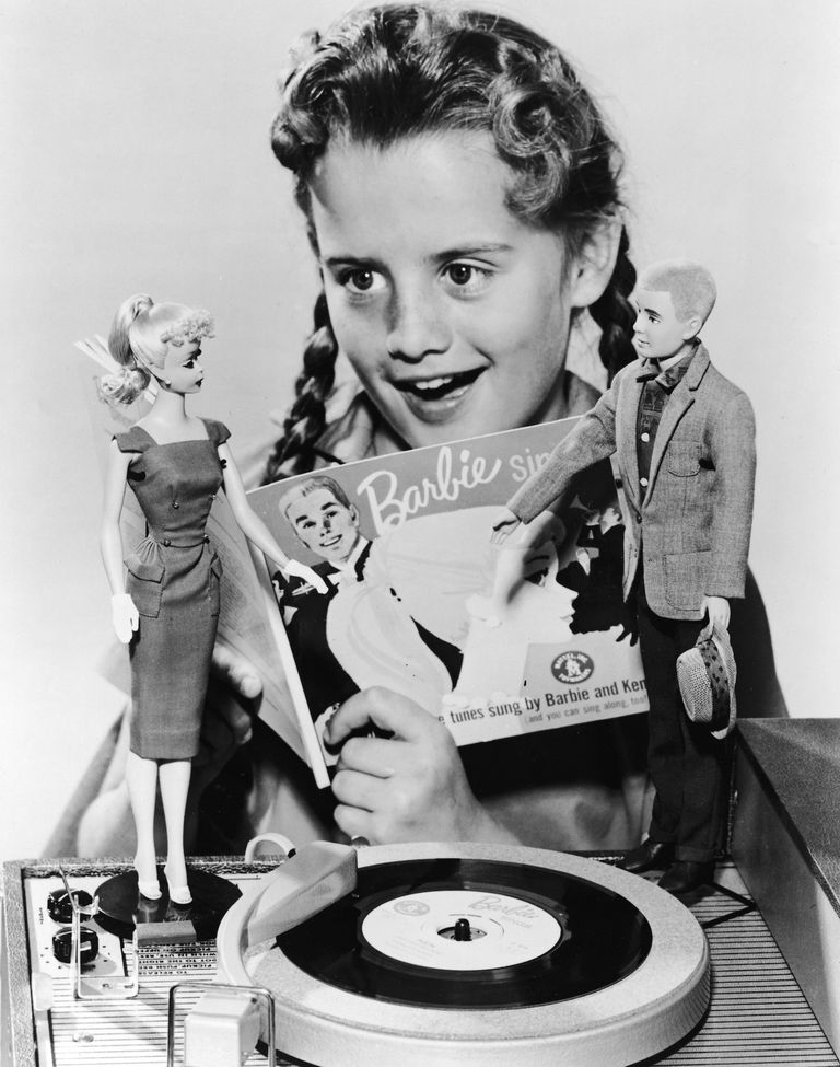 https://www.gettyimages.co.uk/detail/news-photo/girl-in-pigtails-sings-along-with-a-7-record-called-barbie-news-photo/51278025?phrase=barbie%20dolls&adppopup=true