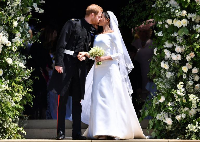 https://www.gettyimages.co.uk/detail/news-photo/britains-prince-harry-duke-of-sussex-kisses-his-wife-meghan-news-photo/960091094?phrase=harry%20meghan%20wedding