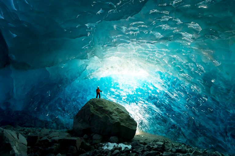 https://www.gettyimages.co.uk/detail/photo/man-inside-a-glacial-ice-cave-royalty-free-image/1454039323?phrase=cave%20exploration&adppopup=true