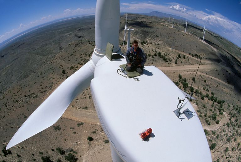 https://www.gettyimages.co.uk/detail/news-photo/man-works-atop-a-wind-turbine-at-the-delaware-mountain-wind-news-photo/526765022 man works wind turbine