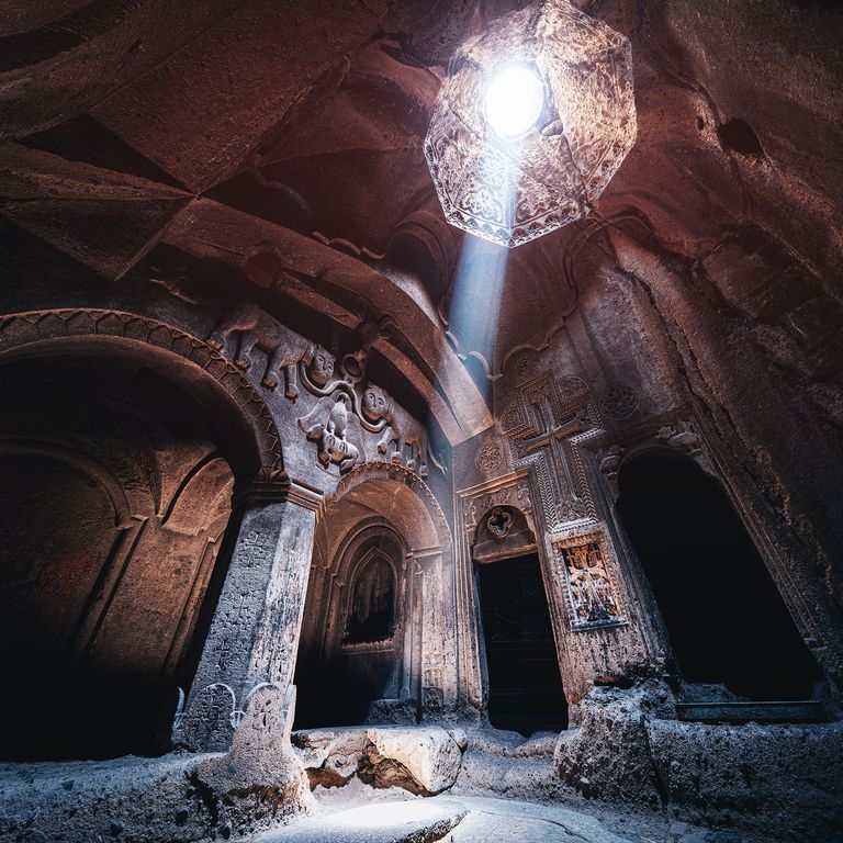 https://www.gettyimages.co.uk/detail/photo/interior-of-the-famous-geghard-monastery-and-church-royalty-free-image/1354820632?phrase=cave%20temple&adppopup=true