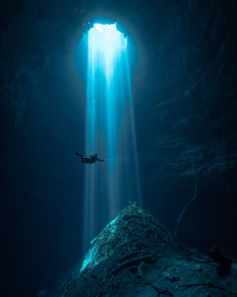 https://www.gettyimages.co.uk/detail/photo/scuba-diver-in-light-beams-in-mexico-cenote-royalty-free-image/1428014952?phrase=cave%20diving&adppopup=true
