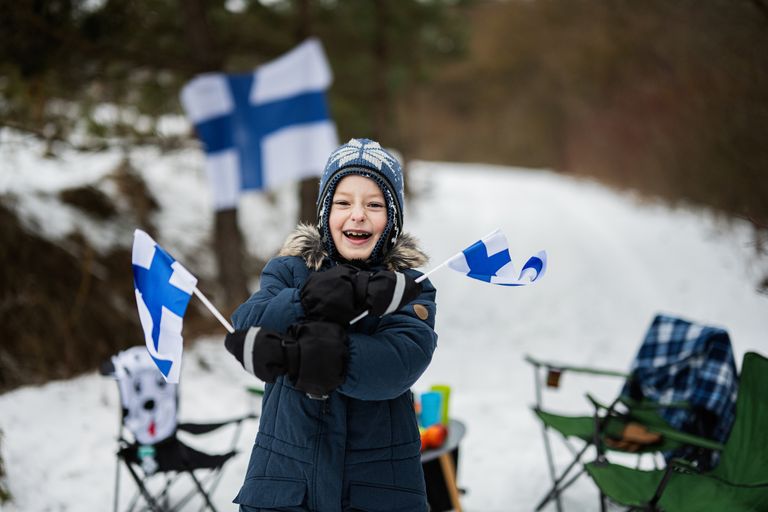 https://www.gettyimages.com/detail/photo/finnish-boy-with-finland-flags-on-a-nice-winter-day-royalty-free-image/1470161437?phrase=Finland%20people&adppopup=true
