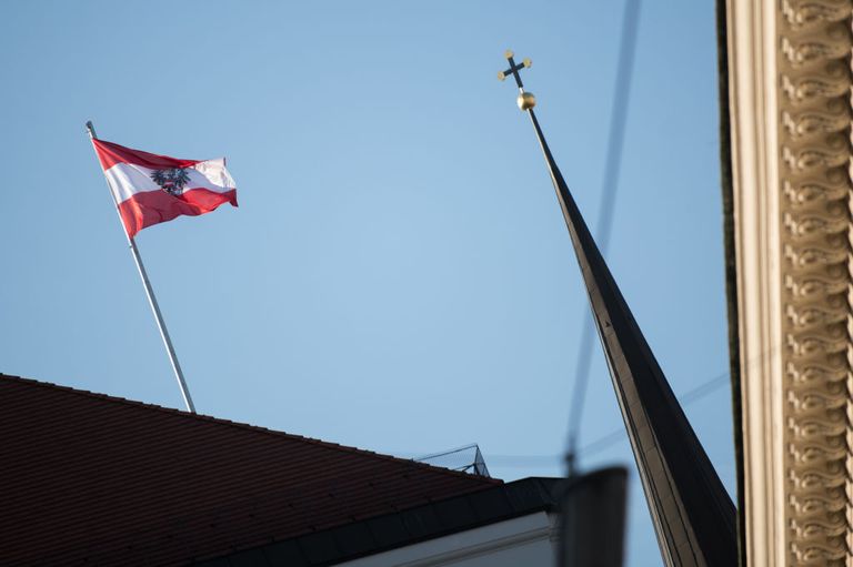 https://www.gettyimages.co.uk/detail/news-photo/an-austrian-flag-seen-flying-in-hofburg-palace-in-vienna-news-photo/948342138