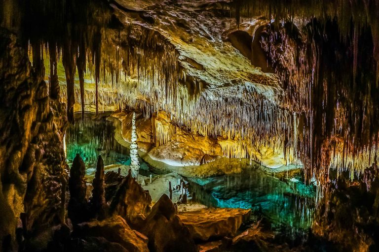 https://www.gettyimages.co.uk/detail/photo/cuevas-del-drach-or-dragon-cave-mallorca-island-royalty-free-image/1179433711?phrase=stalactite&adppopup=true