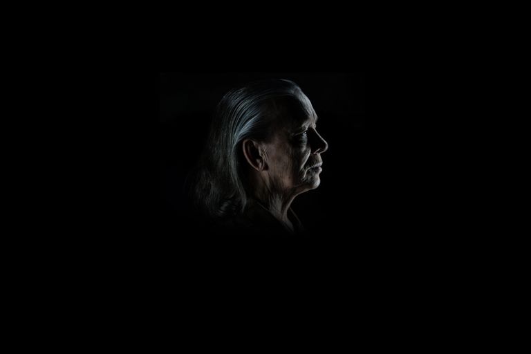 https://www.gettyimages.co.uk/detail/photo/senior-woman-face-in-darkness-royalty-free-image/1289541985?adppopup=true