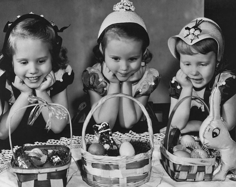 https://www.gettyimages.com/detail/news-photo/three-little-girls-in-easter-bonnets-eagerly-contemplate-news-photo/107694295?adppopup=true