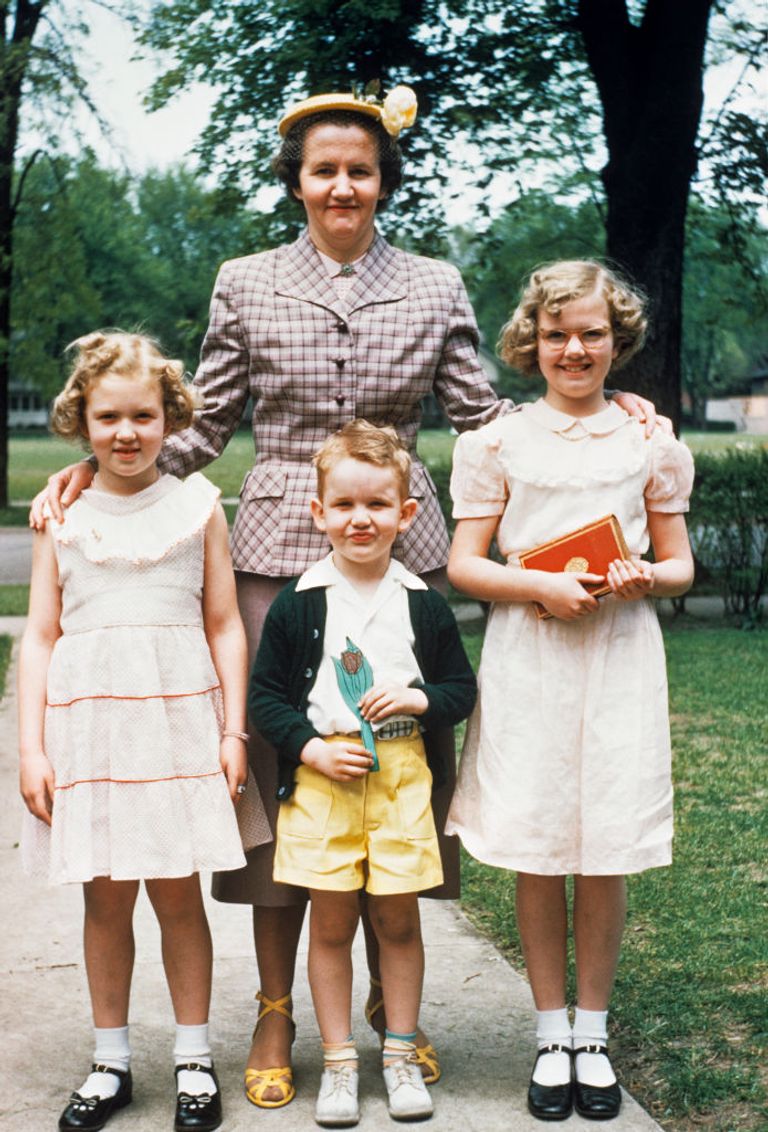 https://www.gettyimages.com/detail/news-photo/1950s-mother-and-three-children-all-dressed-up-posing-for-news-photo/1285515718?adppopup=true