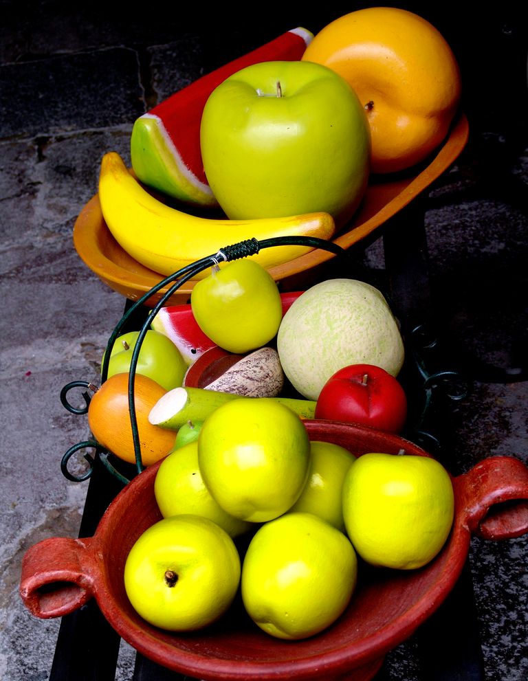 https://www.gettyimages.co.uk/detail/photo/some-wooden-fruit-arranged-in-baskets-royalty-free-image/487679407?phrase=artificial+fruit+basket