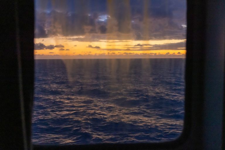 https://www.gettyimages.co.uk/detail/photo/cloudy-sky-over-seascape-seen-through-window-of-royalty-free-image/1466771541?+phrase=cruise+ship&adppopup=true