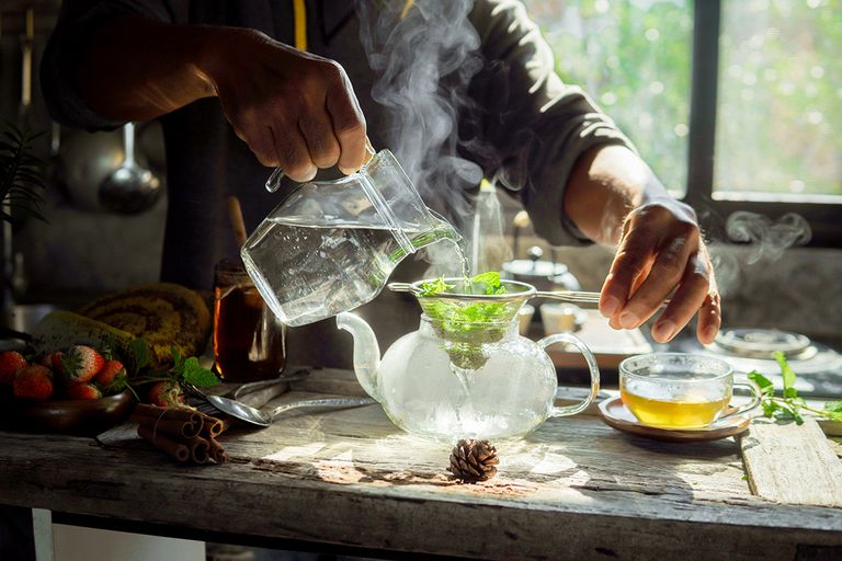 https://www.gettyimages.com/detail/photo/hot-water-on-mint-is-to-make-for-a-teapot-of-mint-royalty-free-image/1470672769?phrase=peppermint+tea