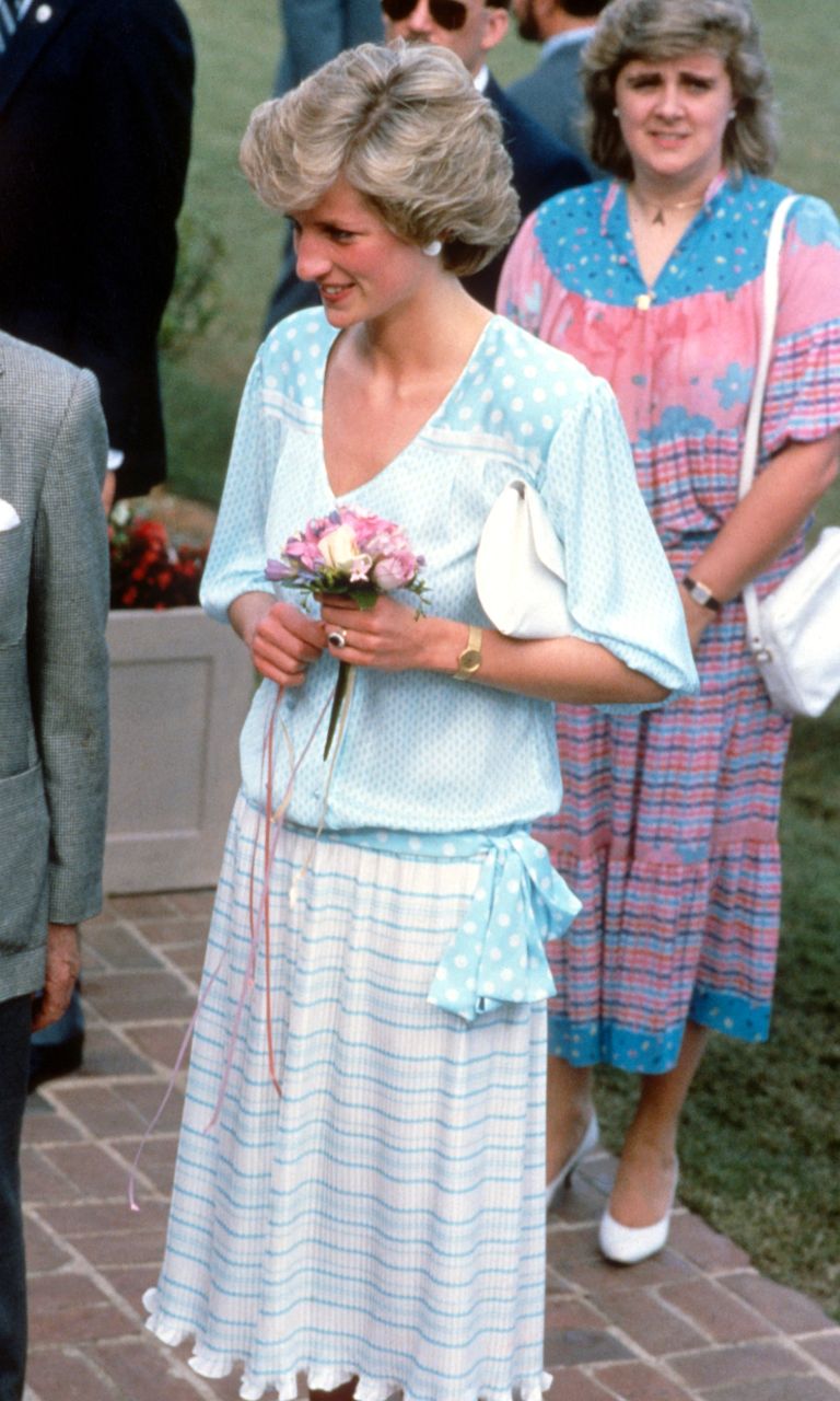 https://www.gettyimages.co.uk/detail/news-photo/diana-princess-of-wales-wearing-a-pale-blue-and-white-dress-news-photo/1308909954?adppopup=true