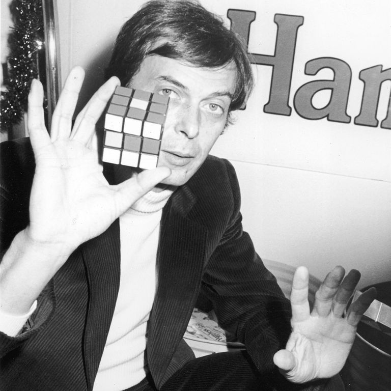 https://www.gettyimages.co.uk/detail/news-photo/hungarian-educator-erno-rubik-holds-up-his-invention-the-news-photo/83173520?adppopup=true
