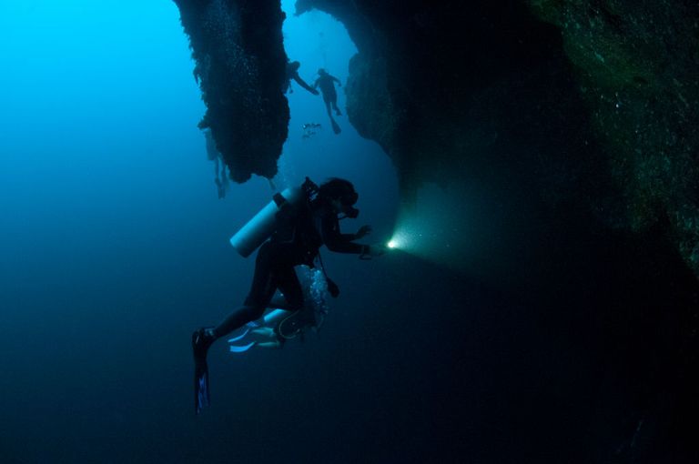 https://www.gettyimages.co.uk/detail/news-photo/scuba-divers-explore-the-stalactites-inside-the-great-blue-news-photo/1288681795